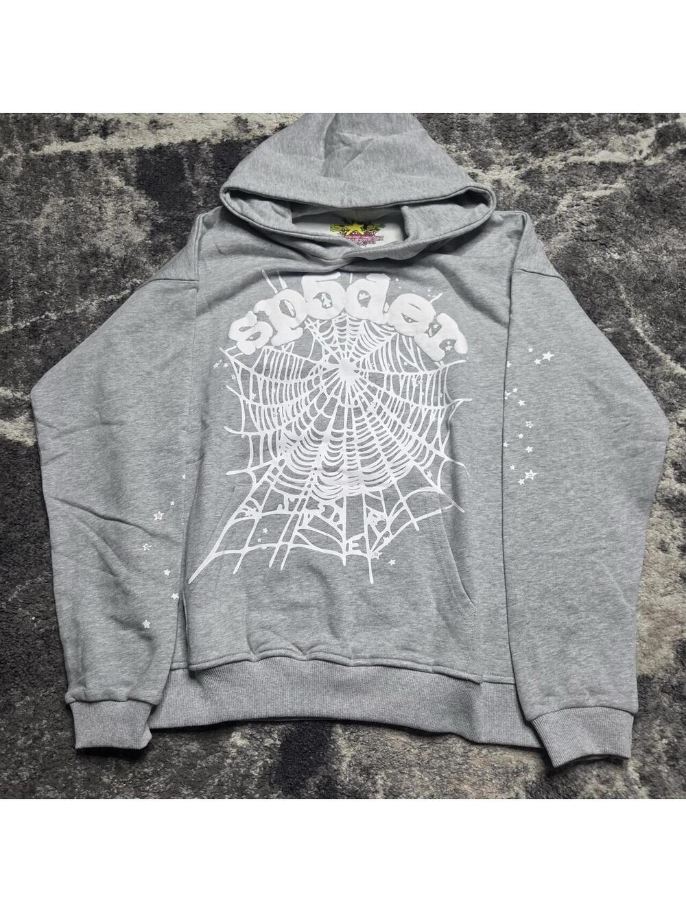 Gray Spider Worldwide hoodie with white spiderweb graphic and 'spider' text
